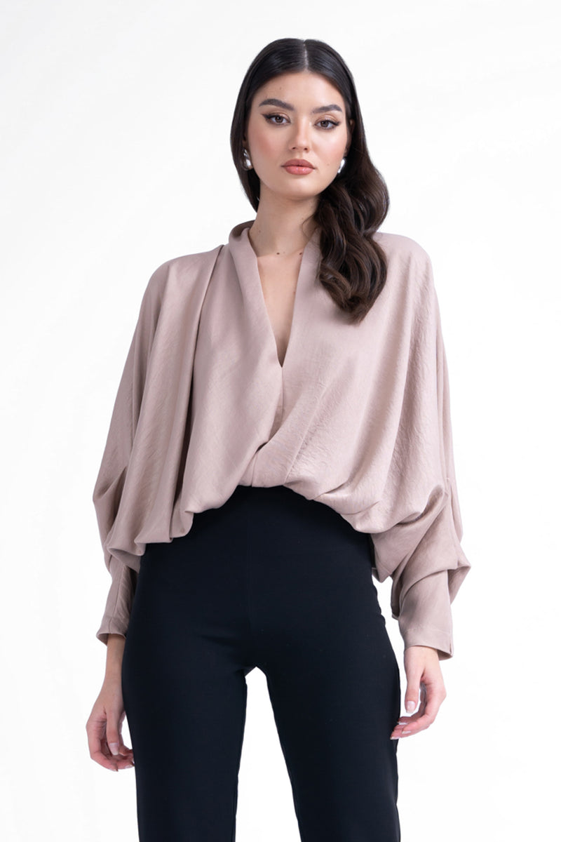 Beige blouse with draped sleeves and V-neck