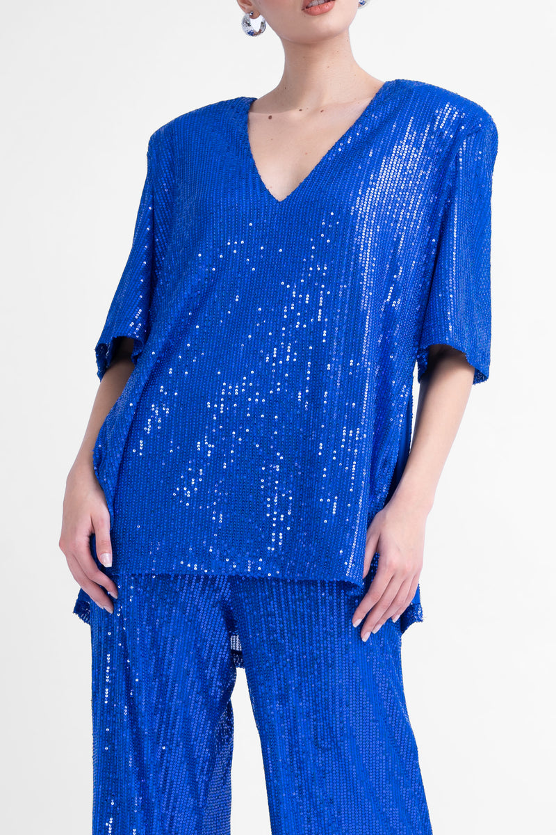 Oversized electric blue sequined blouse with side slit