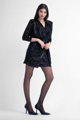 Black sequin mini dress with draping detail and scarf