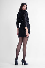 Black sequin mini dress with draping detail and scarf