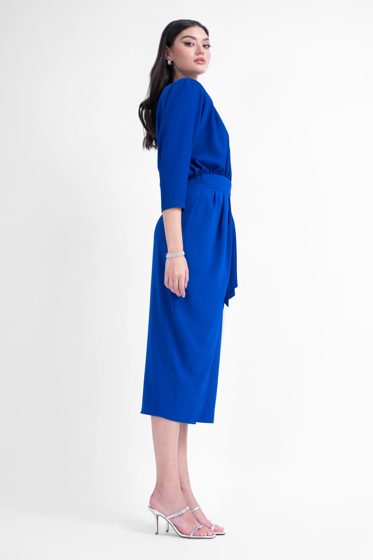 Electric blue midi dress with draping detailing and waist belt