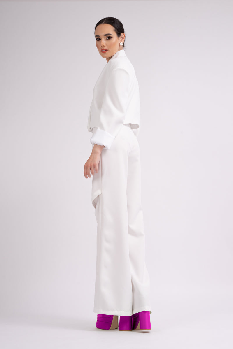 White suit with oversized cropped blazer and trousers with zippers