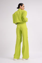 Lime suit with oversized cropped blazer and trousers with zippers