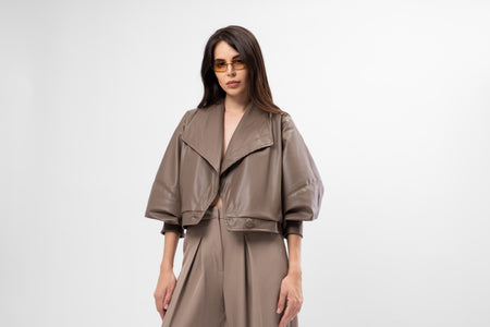 Taupe cropped faux leather jacket with oversized fit
