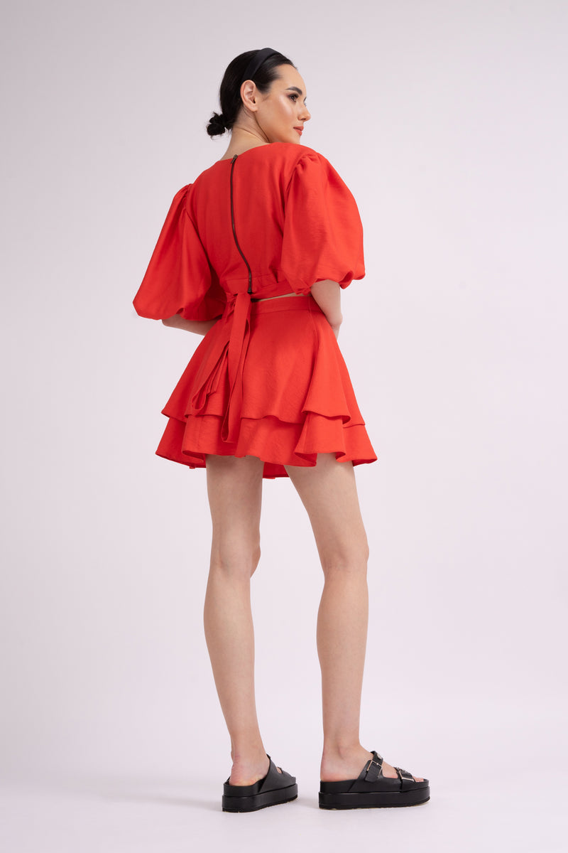 Red mini dress with cut-out and raglan sleeves