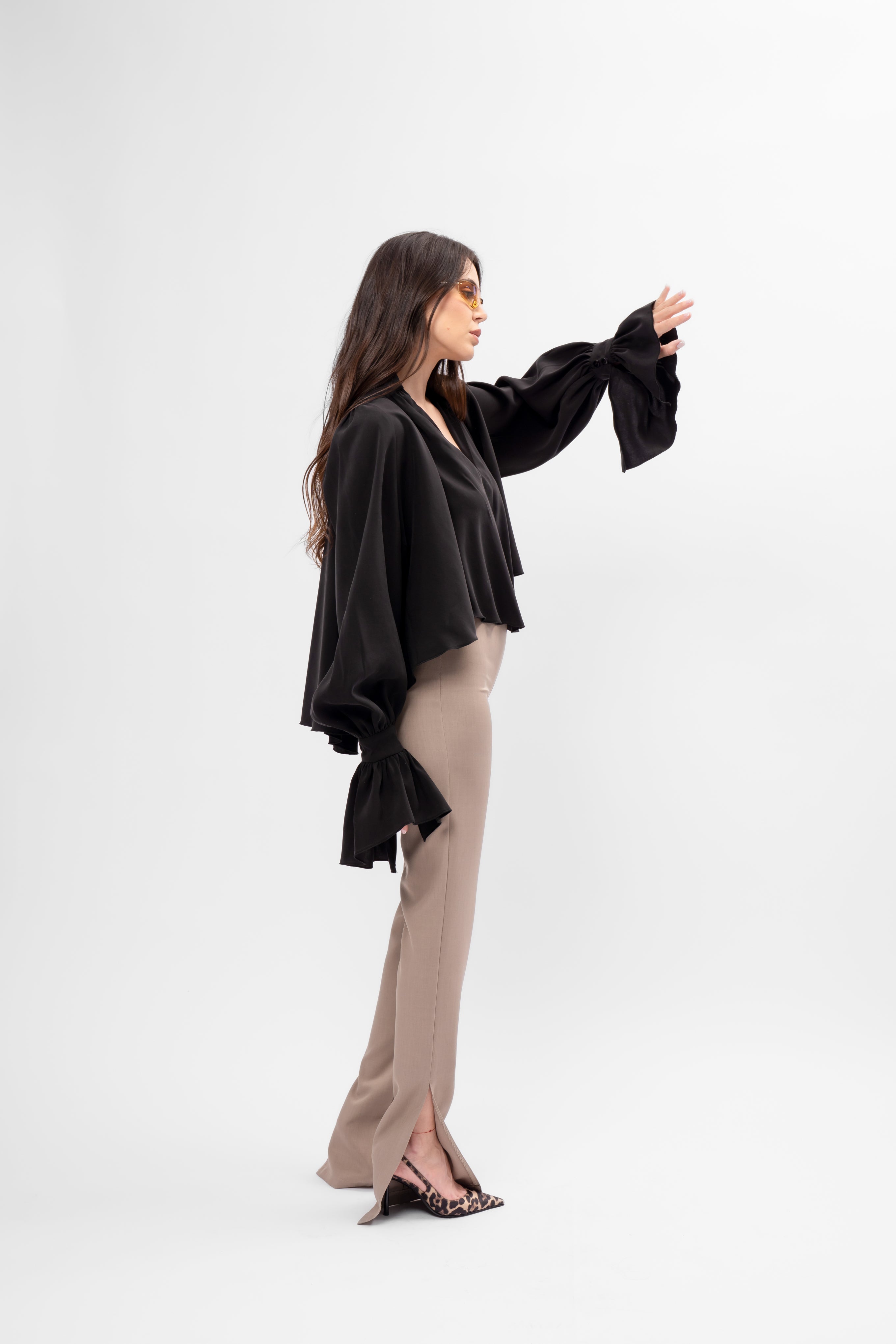 Black oversized shirt with high collar and balloon sleeves