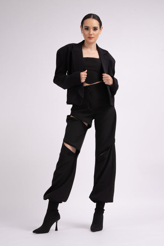 Black trousers with zippers