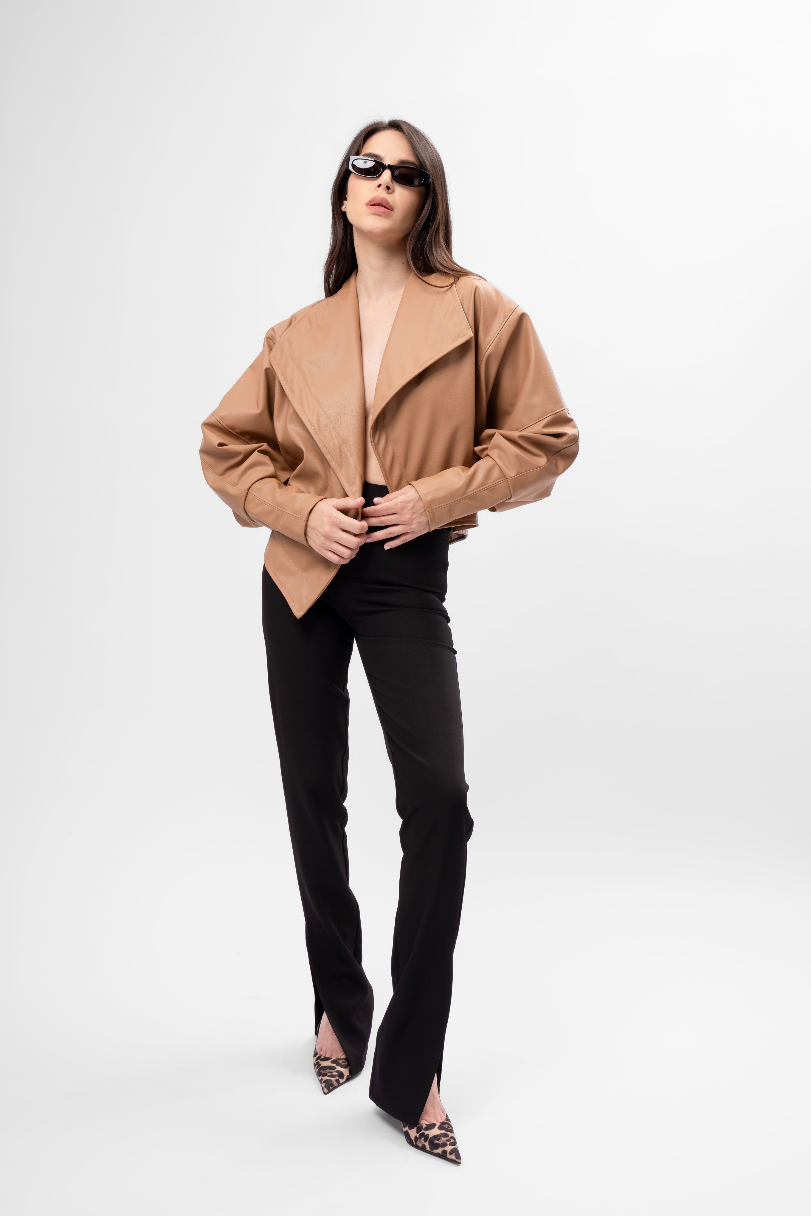 Asymmetric camel cropped faux leather jacket with oversized fit