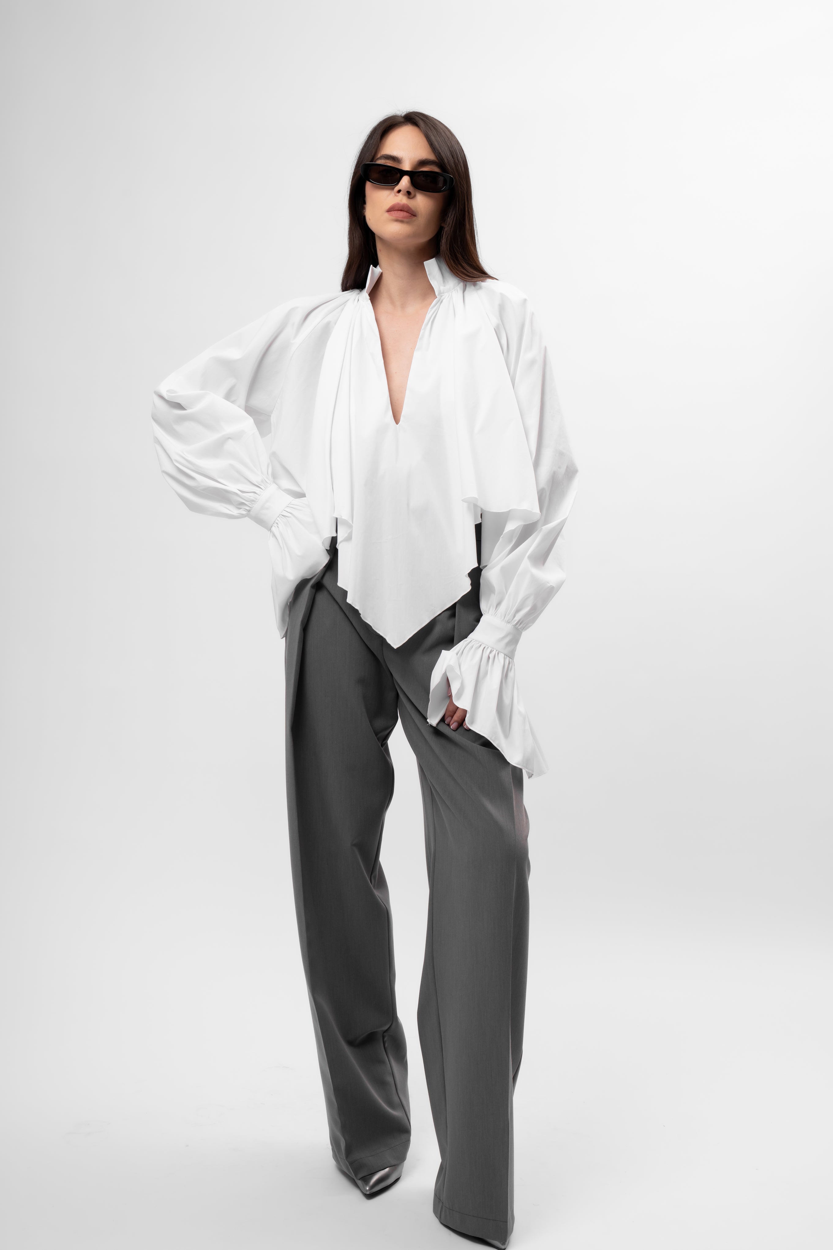 White oversized shirt with high collar and balloon sleeves