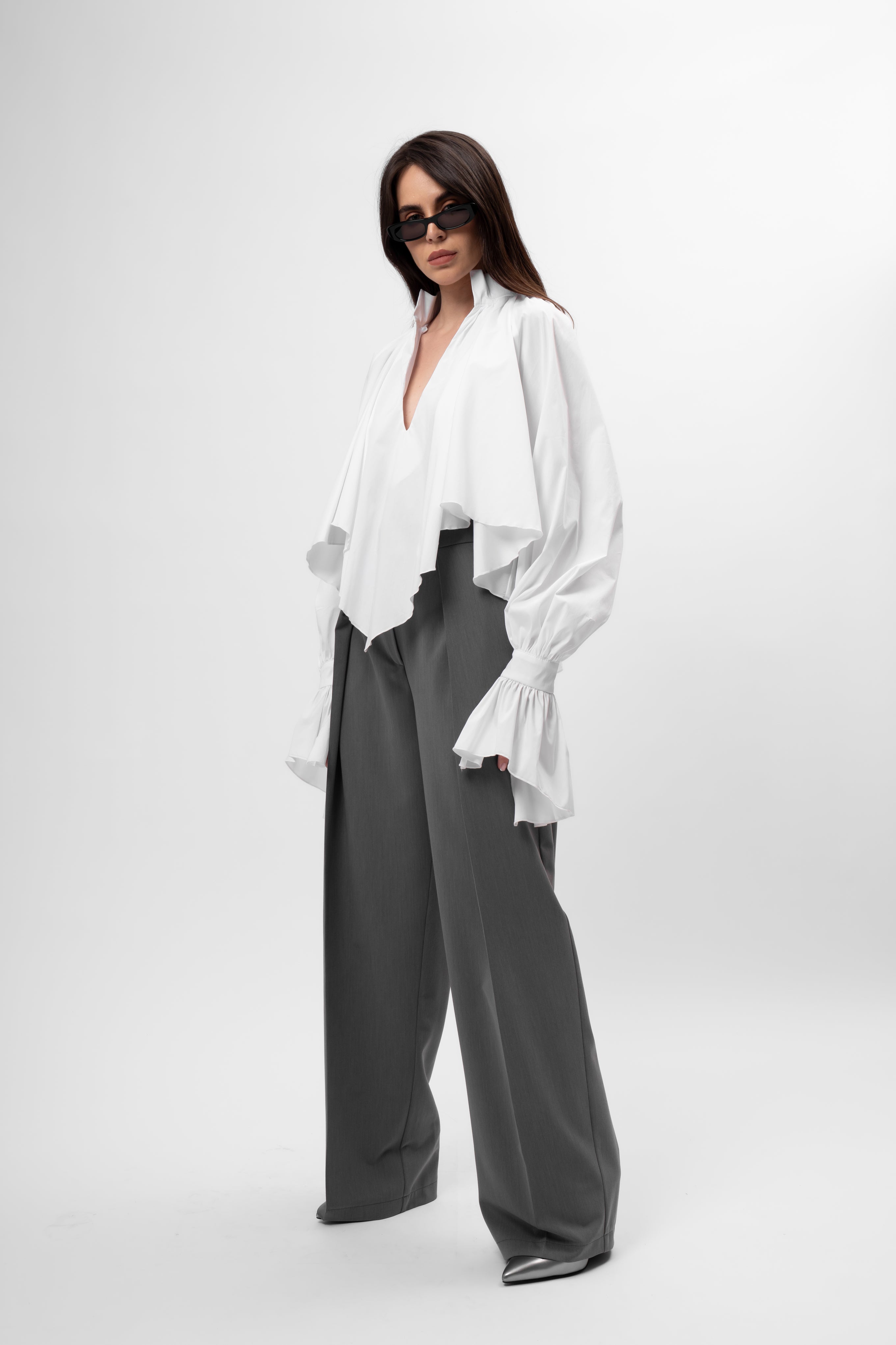 White oversized shirt with high collar and balloon sleeves