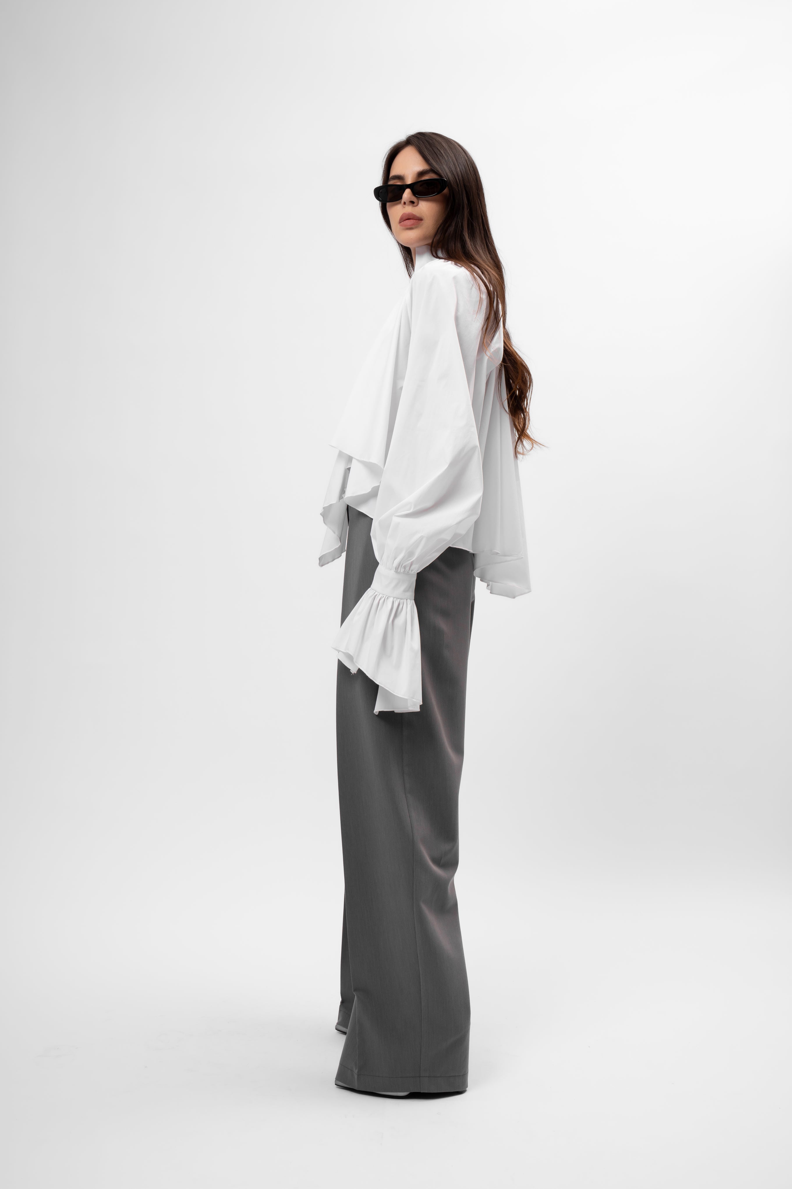 White oversized shirt with high collar and balloon sleeves