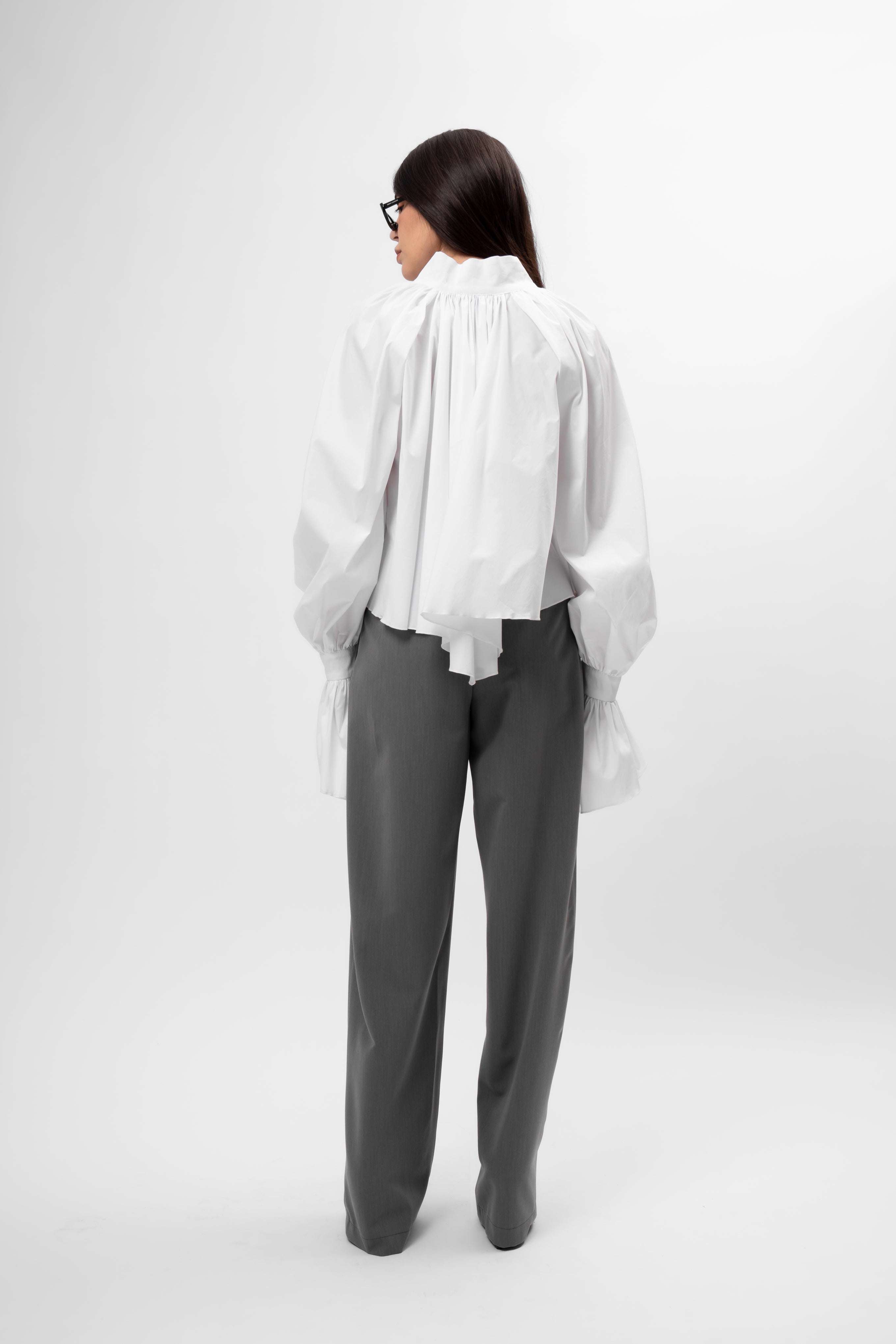 White oversized shirt with high collar and balloon sleeves