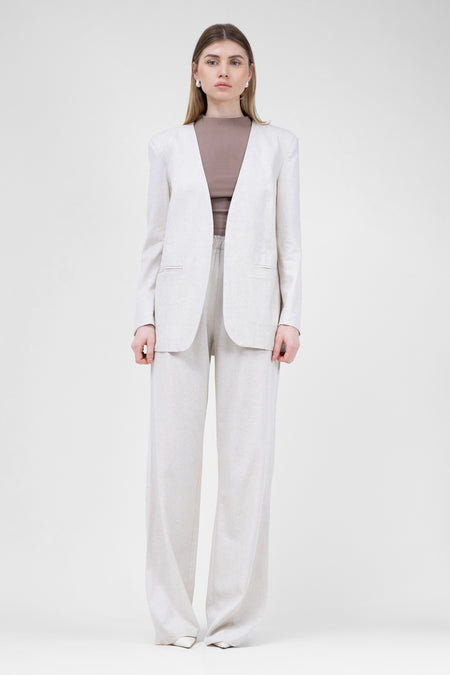 Ivory linen suit with blazer and straight trousers