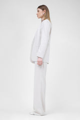 Ivory linen suit with blazer and straight trousers