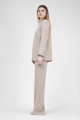 Beige linen suit with blazer and straight trousers