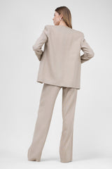 Beige linen suit with blazer and straight trousers