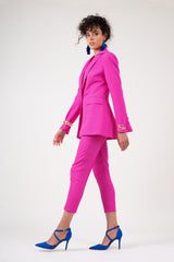 Bright pink trousers with piping effect
