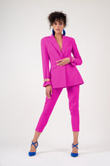 Bright pink trousers with piping effect