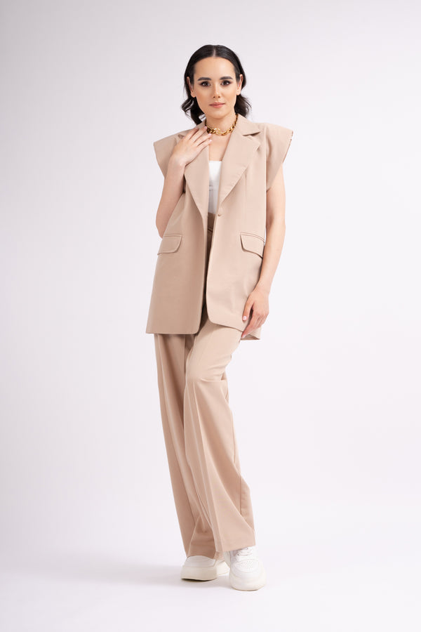 Beige suit with oversized vest and wide leg trousers