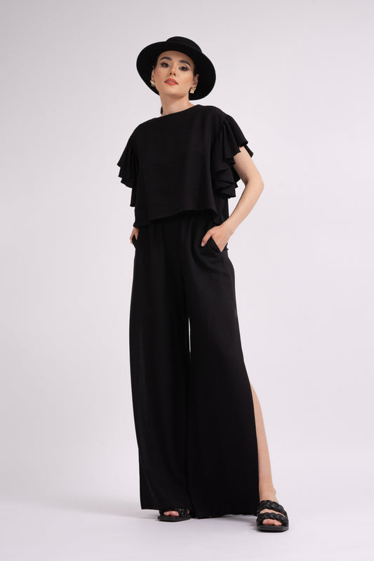 Black set with ruffled T-shirt and trousers with slits