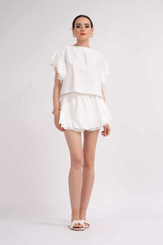 White set with ruffled T-shirt and pants with skirt