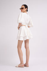 White mini dress with cut-out and raglan sleeves