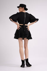 Black mini dress with cut-out and raglan sleeves