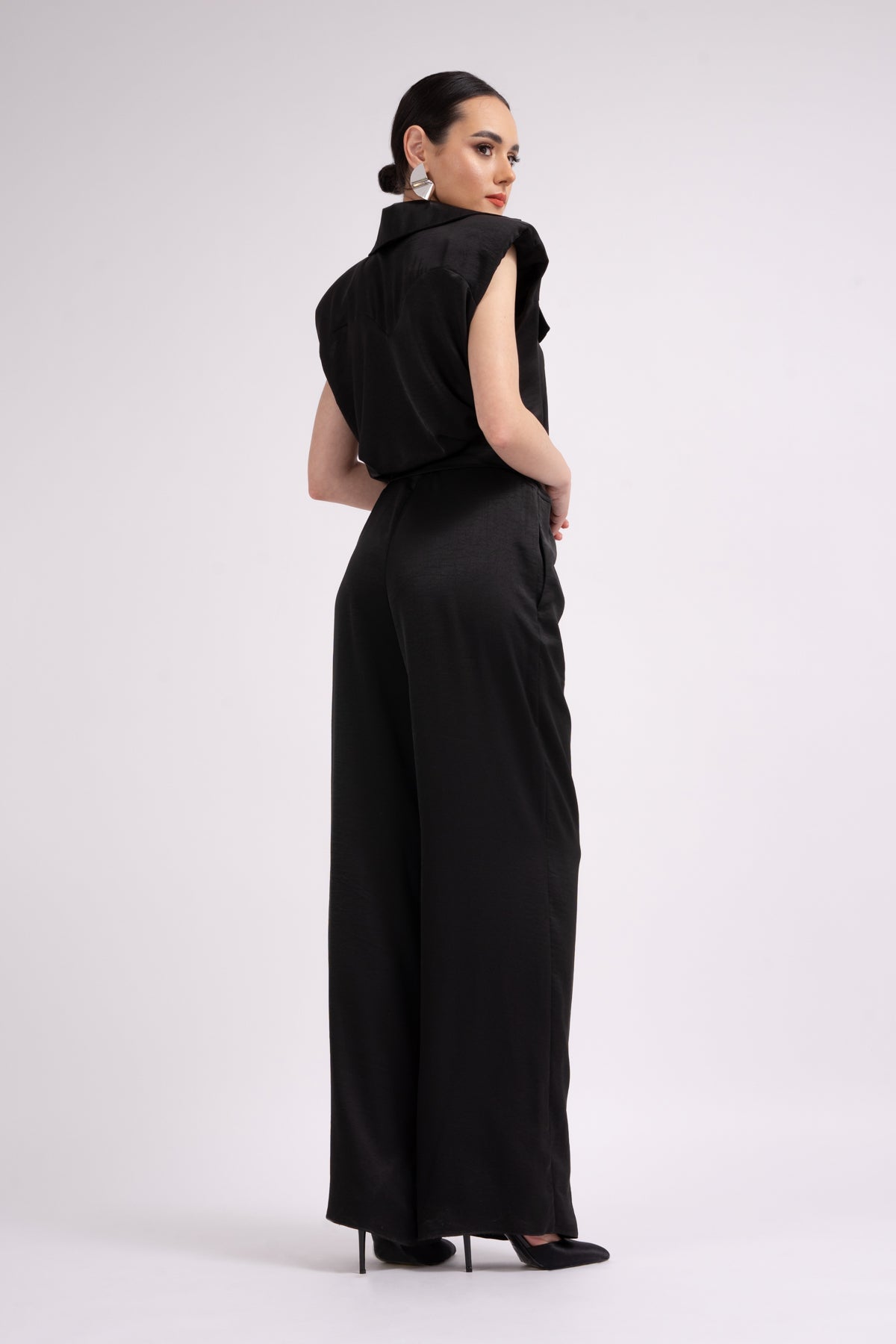 Black maxi jumpsuit with oversized shoulders