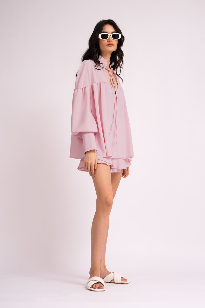 Pastel pink shirt with adjustable cords