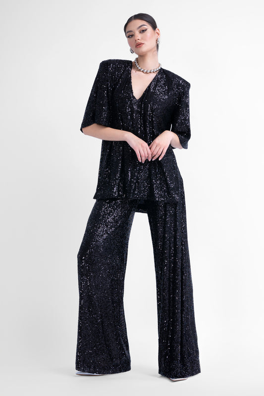 Ensemble assorti à sequins noirs avec chemisier et pantalon large