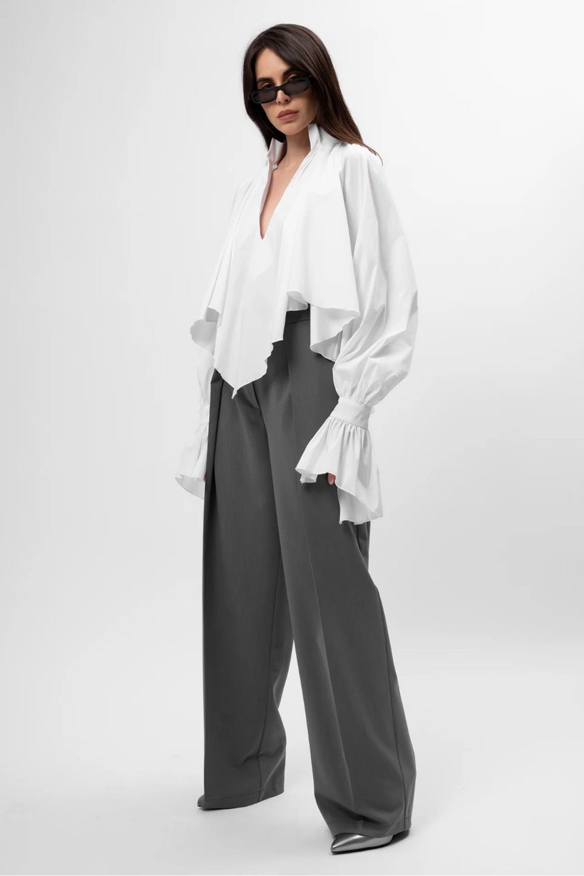 White oversized shirt with high collar and balloon sleeves