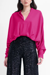 Fuchsia blouse with draped sleeves and v-neck