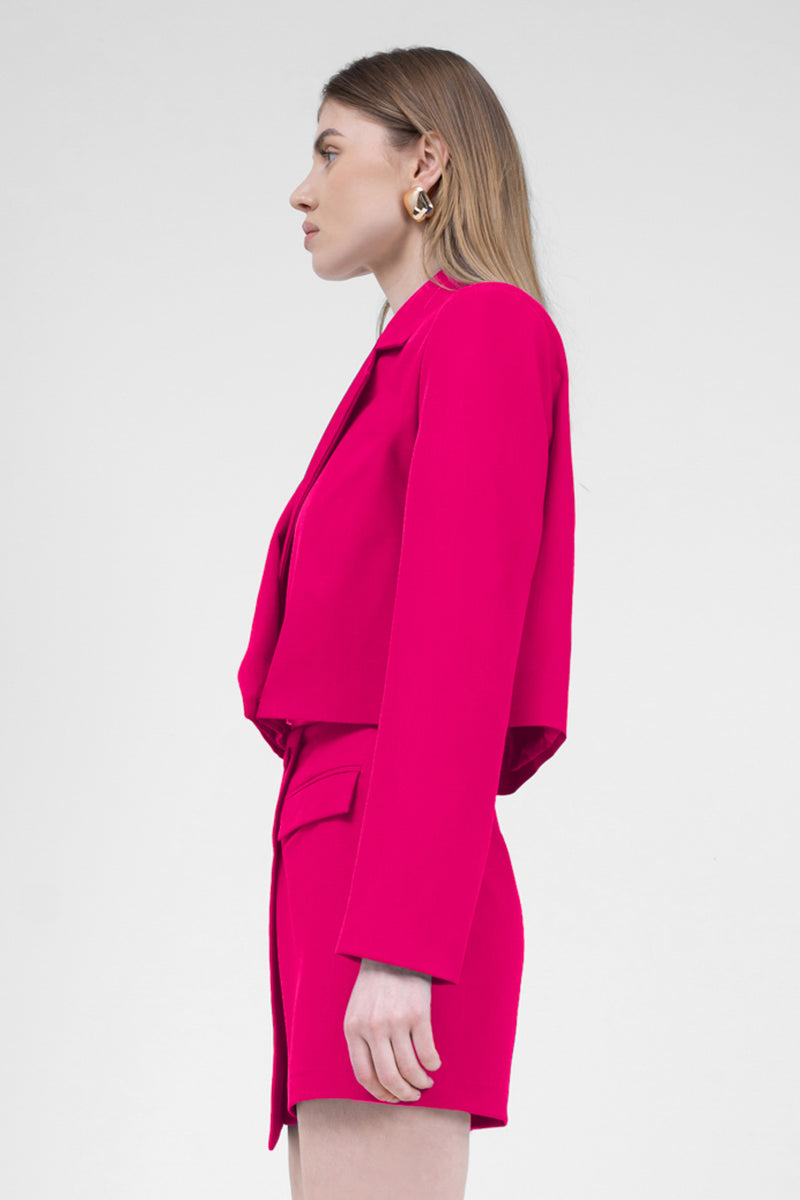 Jupe-culotte asymétrique fuchsia avec poches