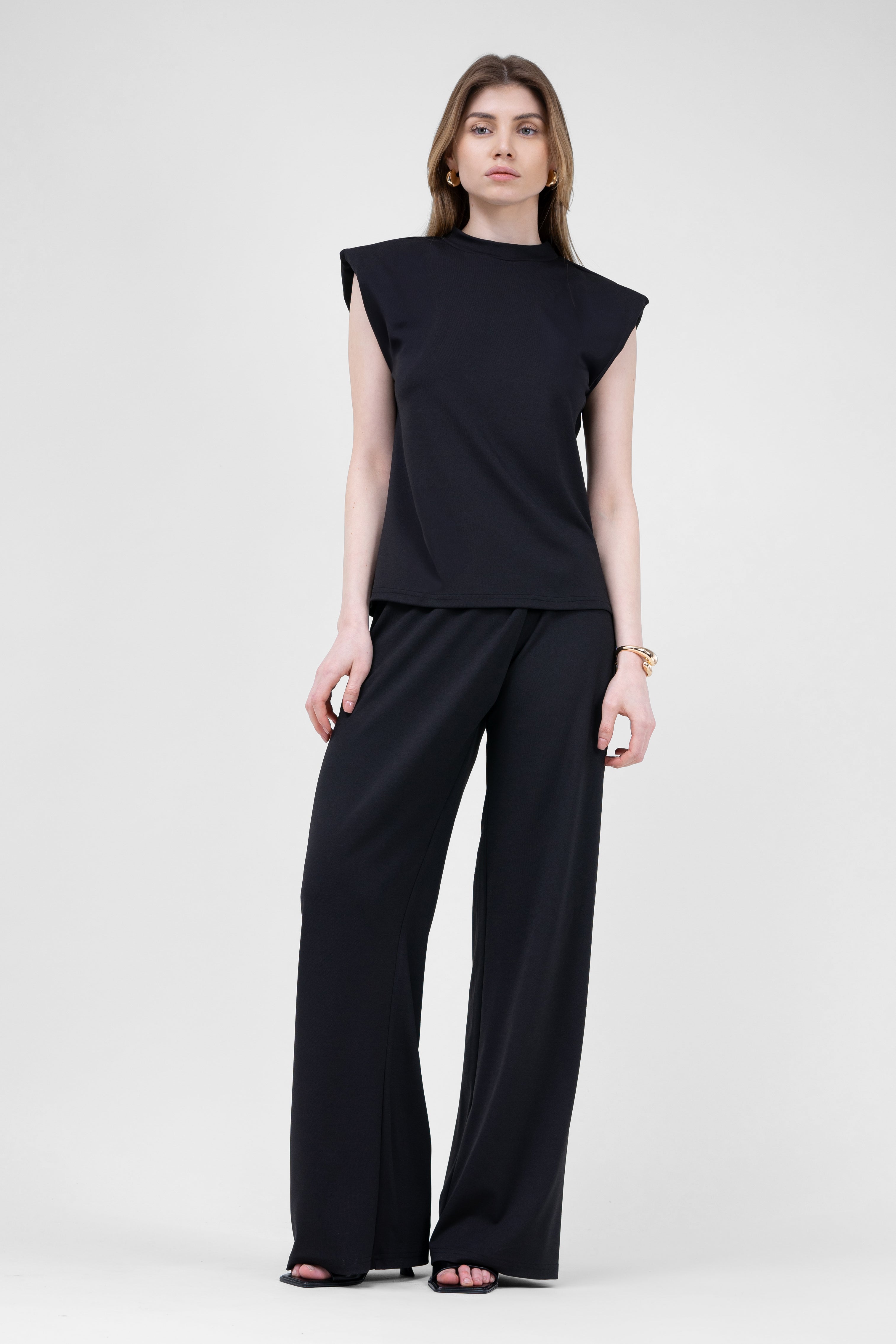 Black Set With T-shirt And Asymmetrical Wide Leg Trousers