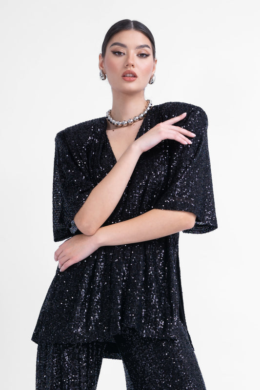 Oversized black sequined blouse with side slit