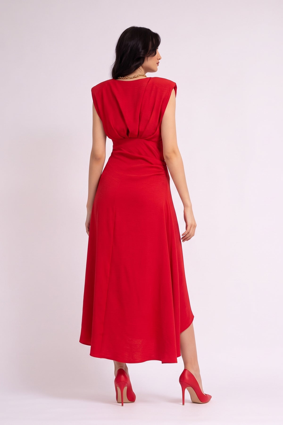 Red beige dress with oversized shoulders and slit