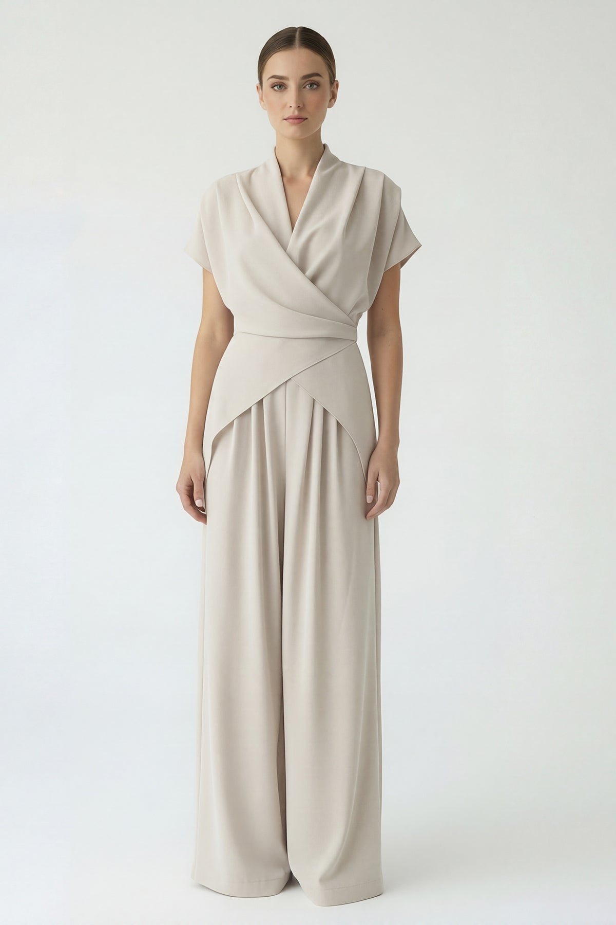 Beige fluid set with a wrap top and wide-leg trousers