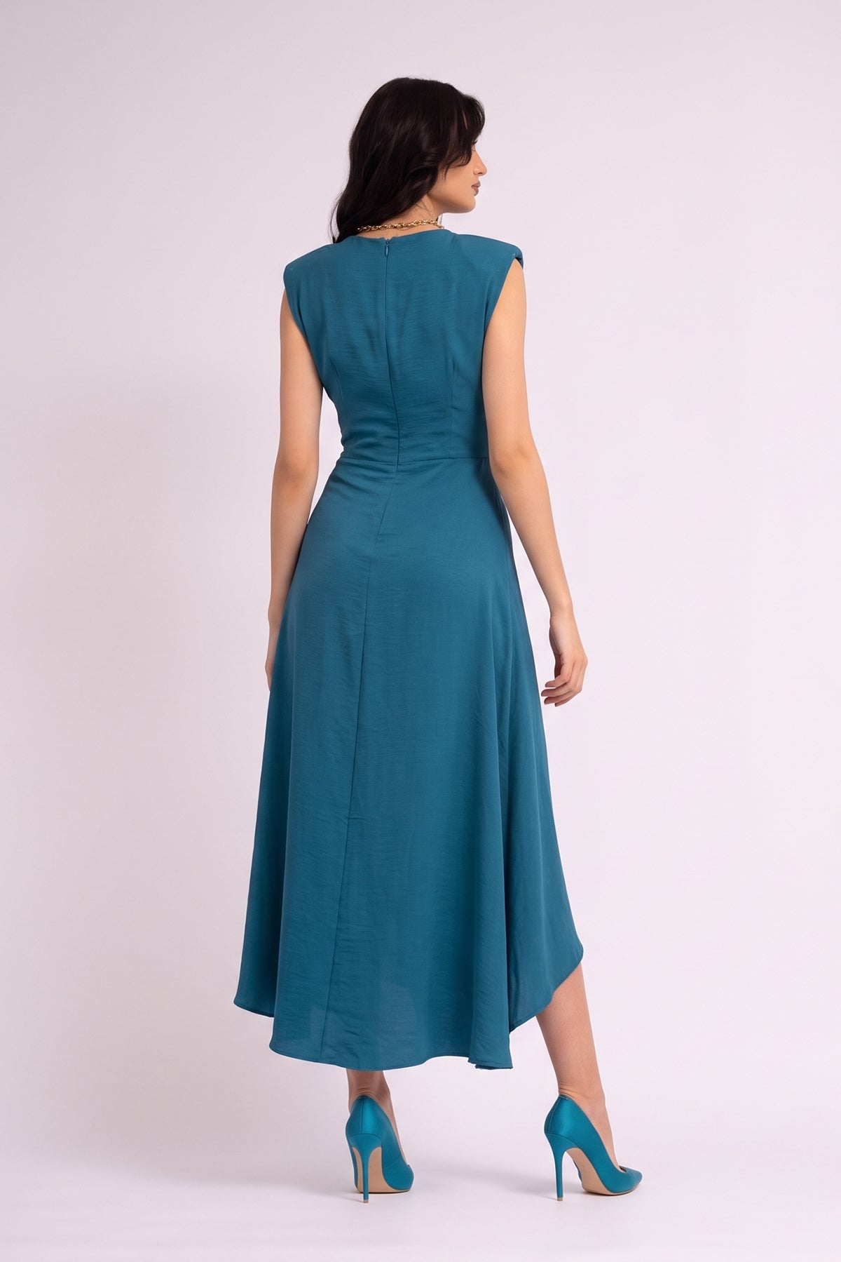 Blue  dress with oversized shoulders and slit