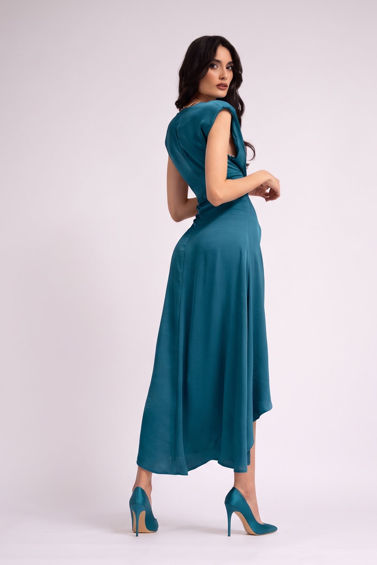Blue  dress with oversized shoulders and slit