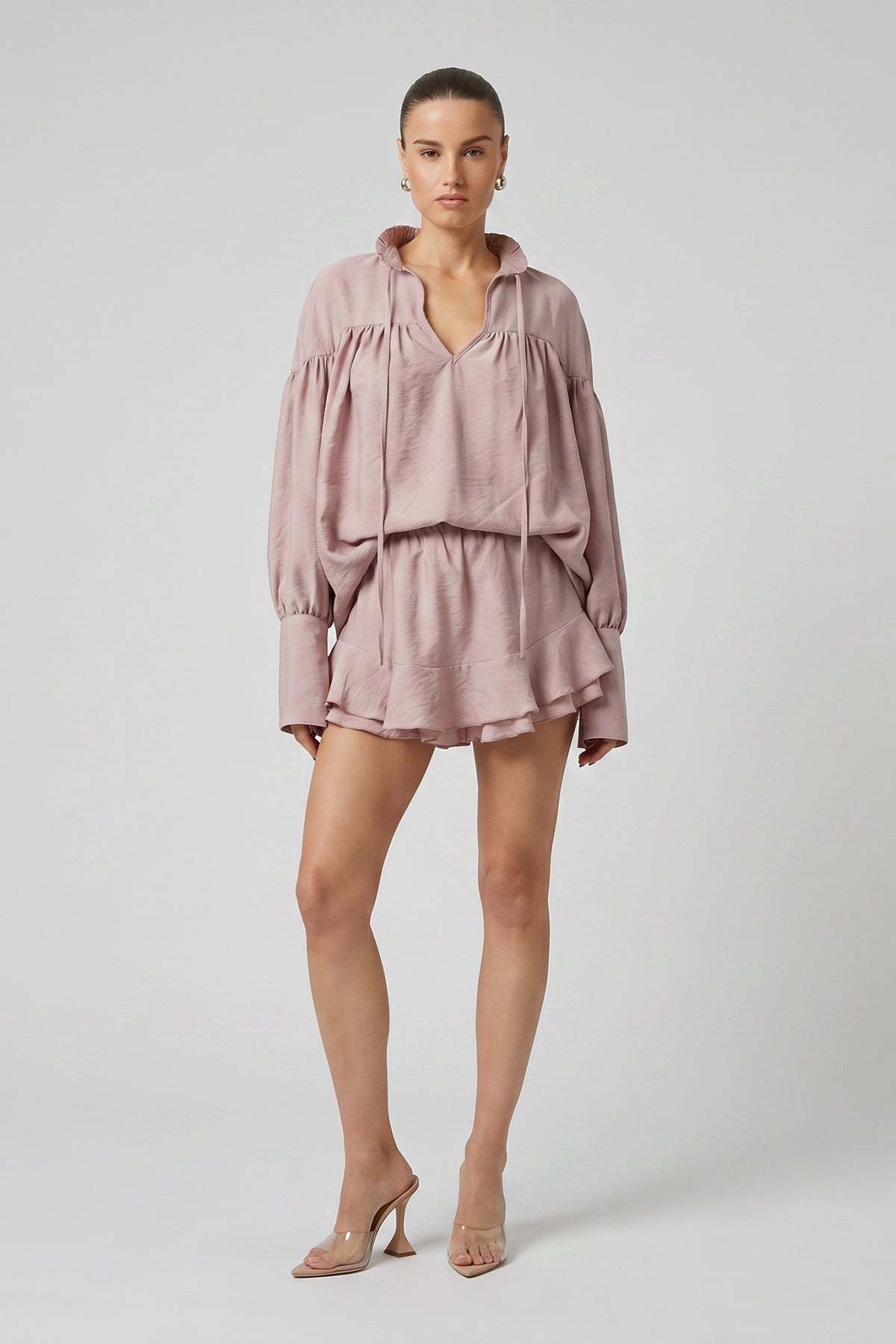 Pink set with blouse and pants with skirt