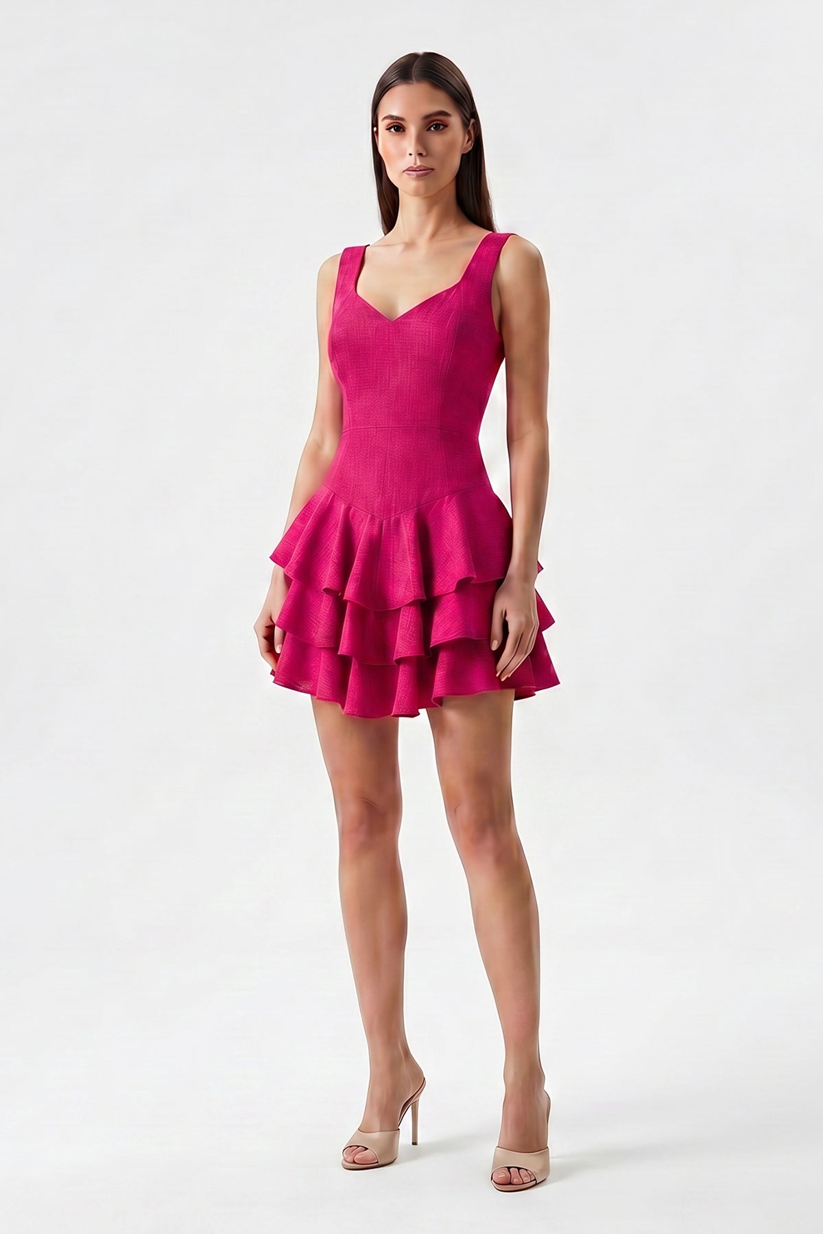 Fuchsia linen mini dress with fitted silhouette and layered ruffle skirt