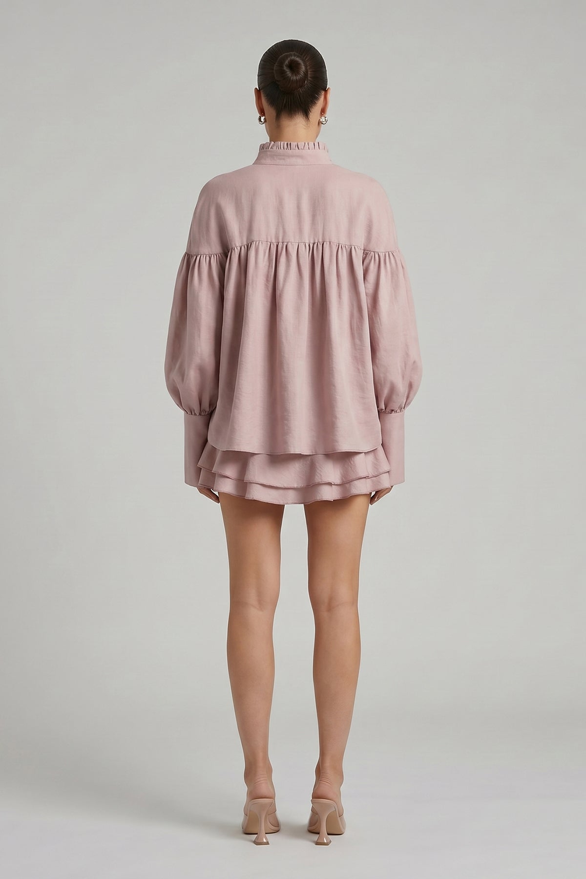 Pink set with blouse and pants with skirt