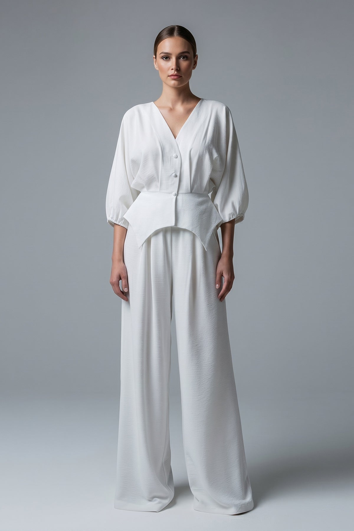 White set with structured top and wide-leg trousers