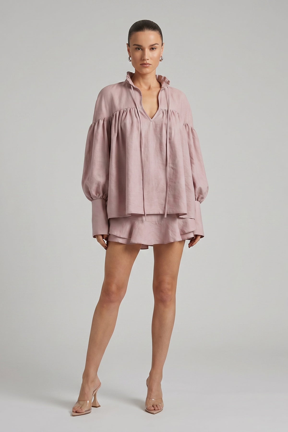 Pink set with blouse and pants with skirt