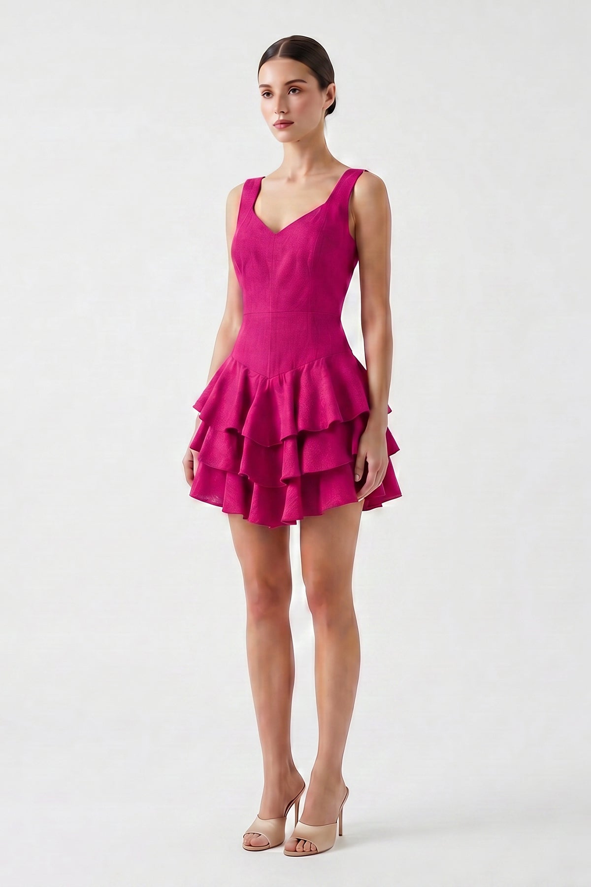 Fuchsia linen mini dress with fitted silhouette and layered ruffle skirt