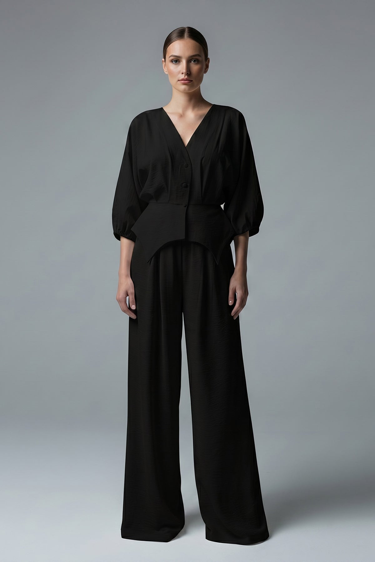 Black set with structured top and wide-leg trousers