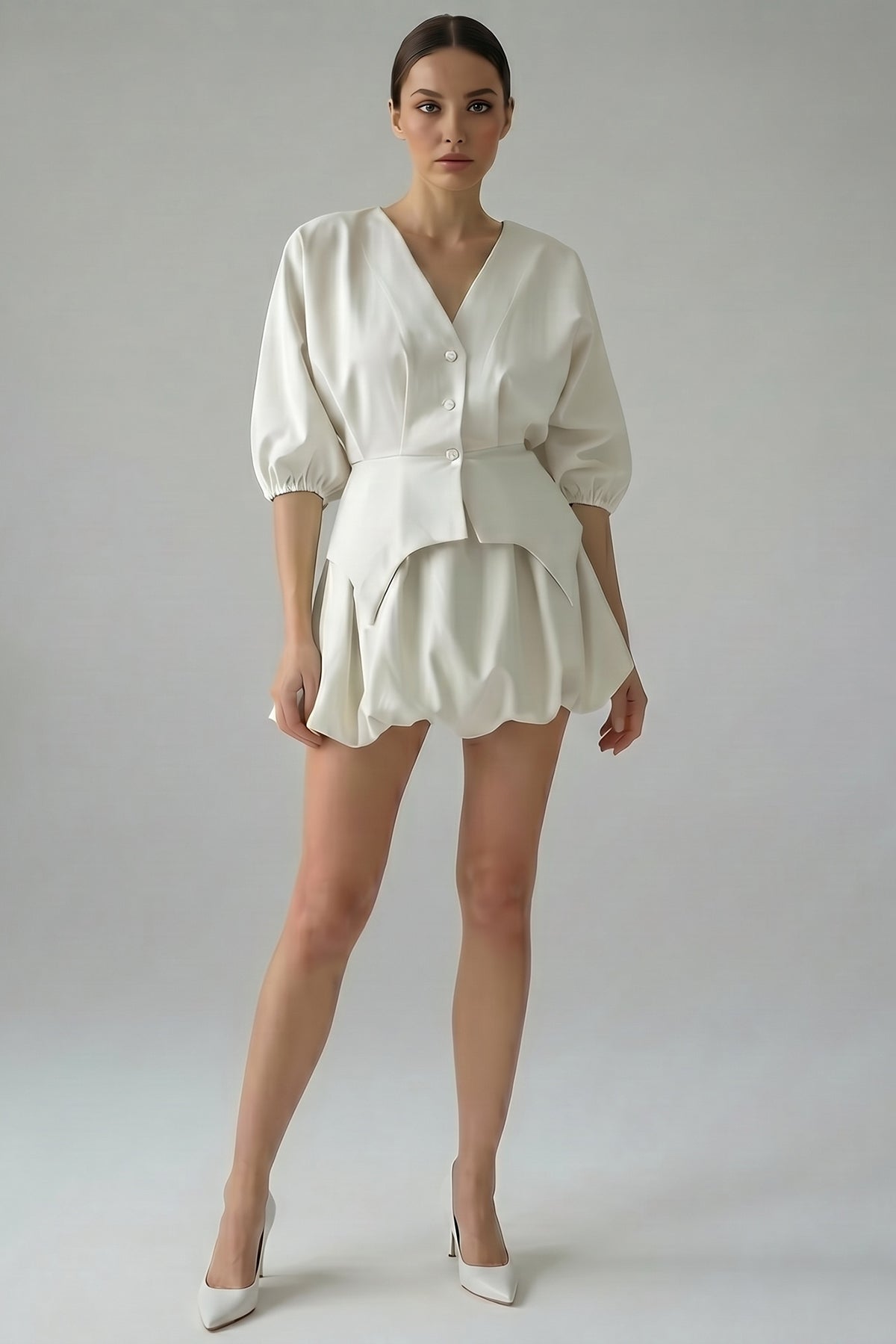 Off White set with structured top and balloon mini skirt