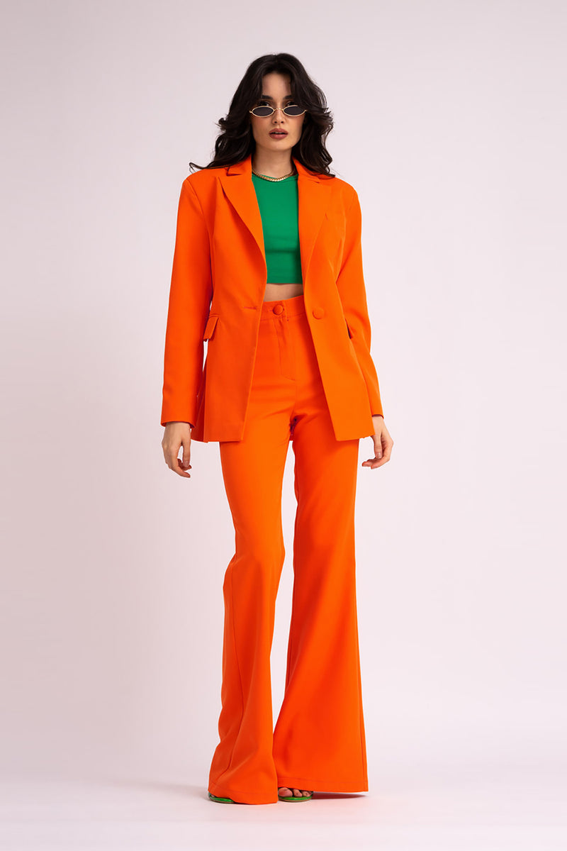 Neon orange suit with slim fit blazer and flared trousers