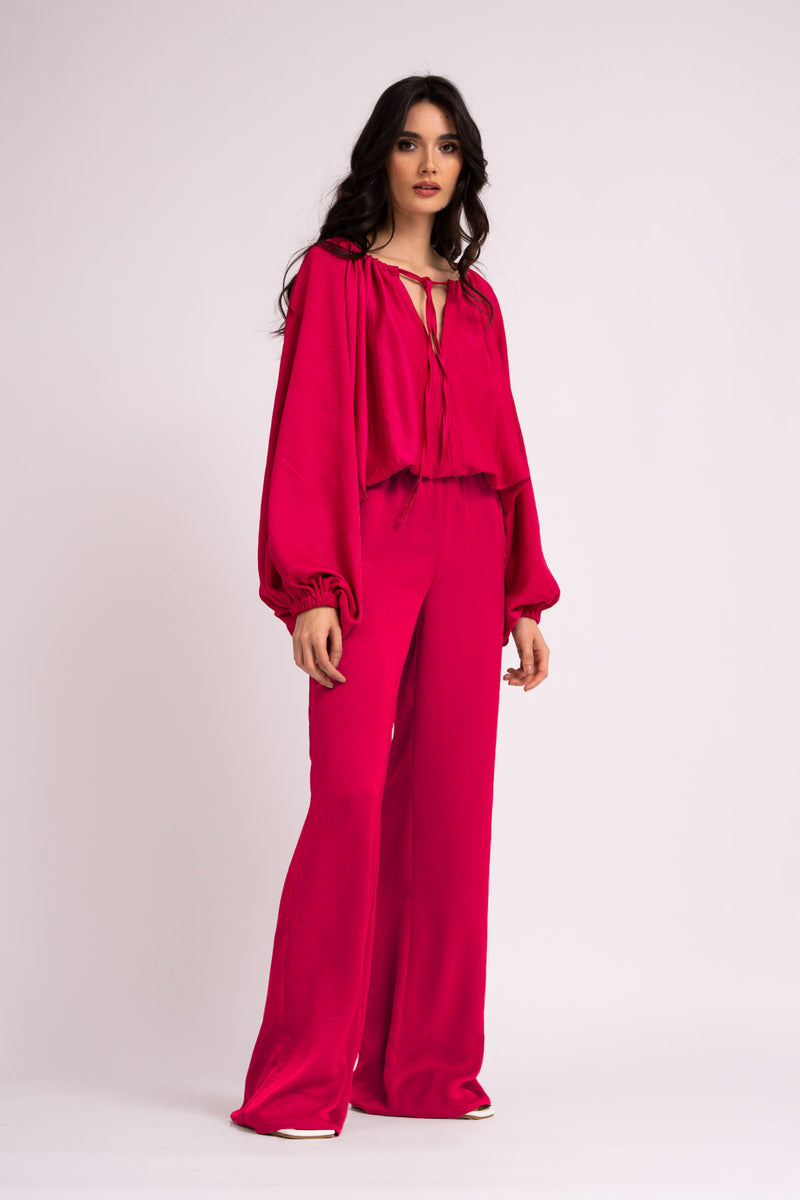 Neon pink set with blouse and wide leg trousers