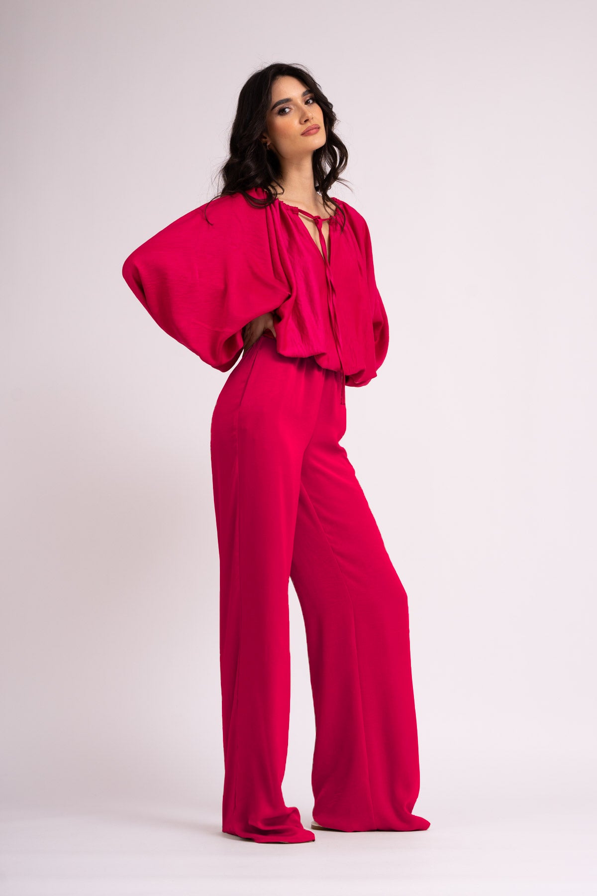 Neon pink set with blouse and wide leg trousers